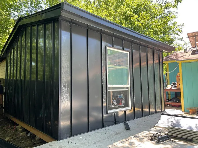 Black standing seam metal wall panels for Metal Roof Installation in Douglas